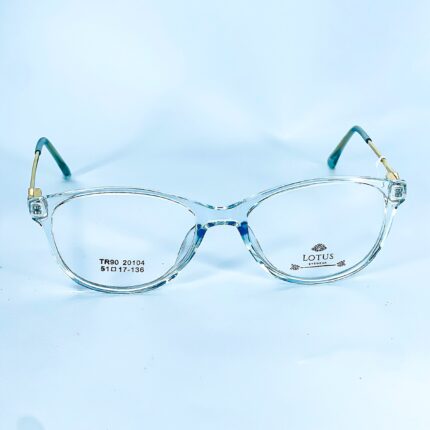 LOTUS FEMENINA - MARCO EN ACETATO TRASLUCIDO DE TONALIDAD AZUL CON DETALLES METALICOS EN LOS BRAZOS